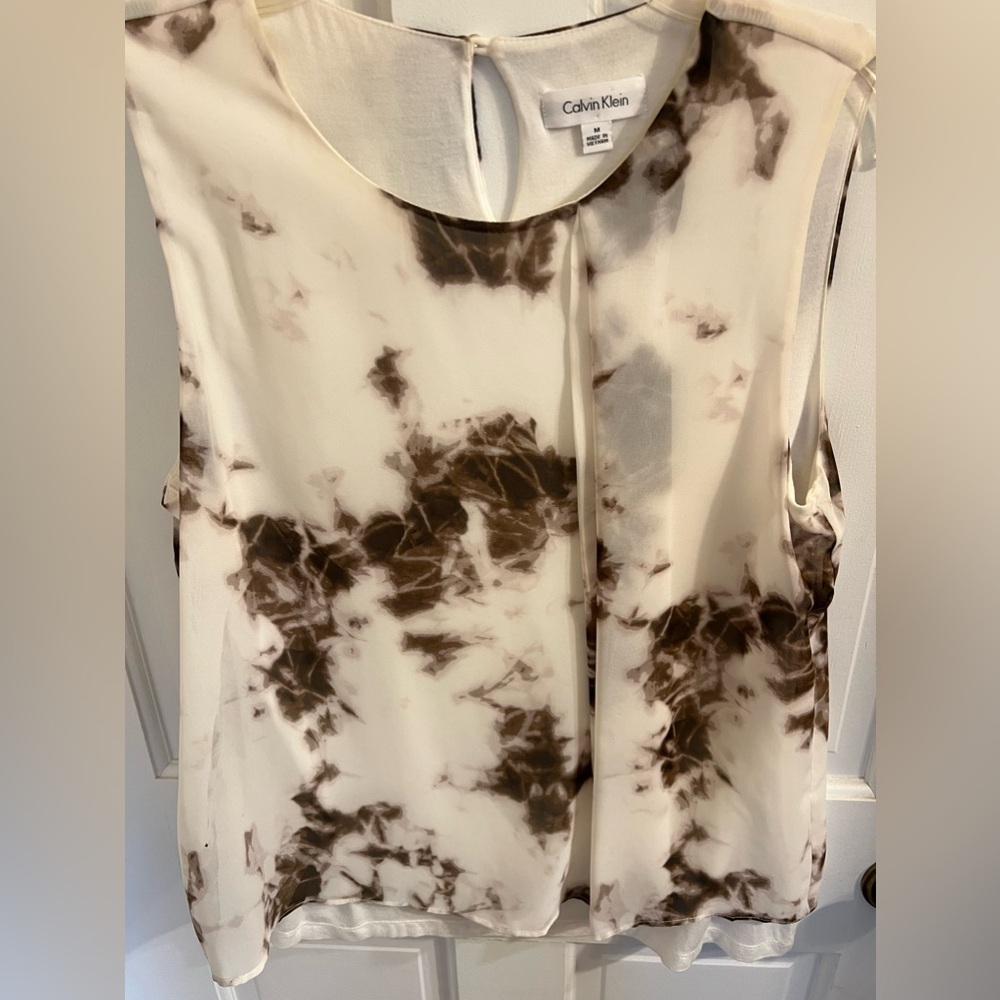 Calvin Klein size medium top with under layer. Pleat on front